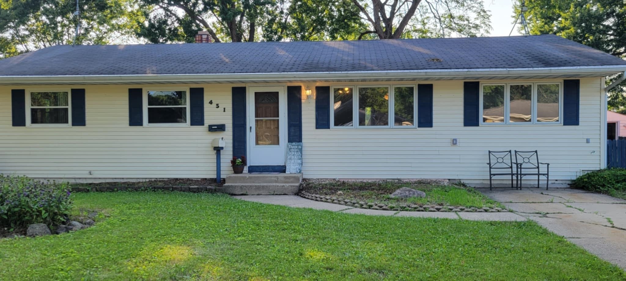 451 Rebecca Road Belvidere, IL 61008 - Photo 2 of 30 a view of a house with a garden