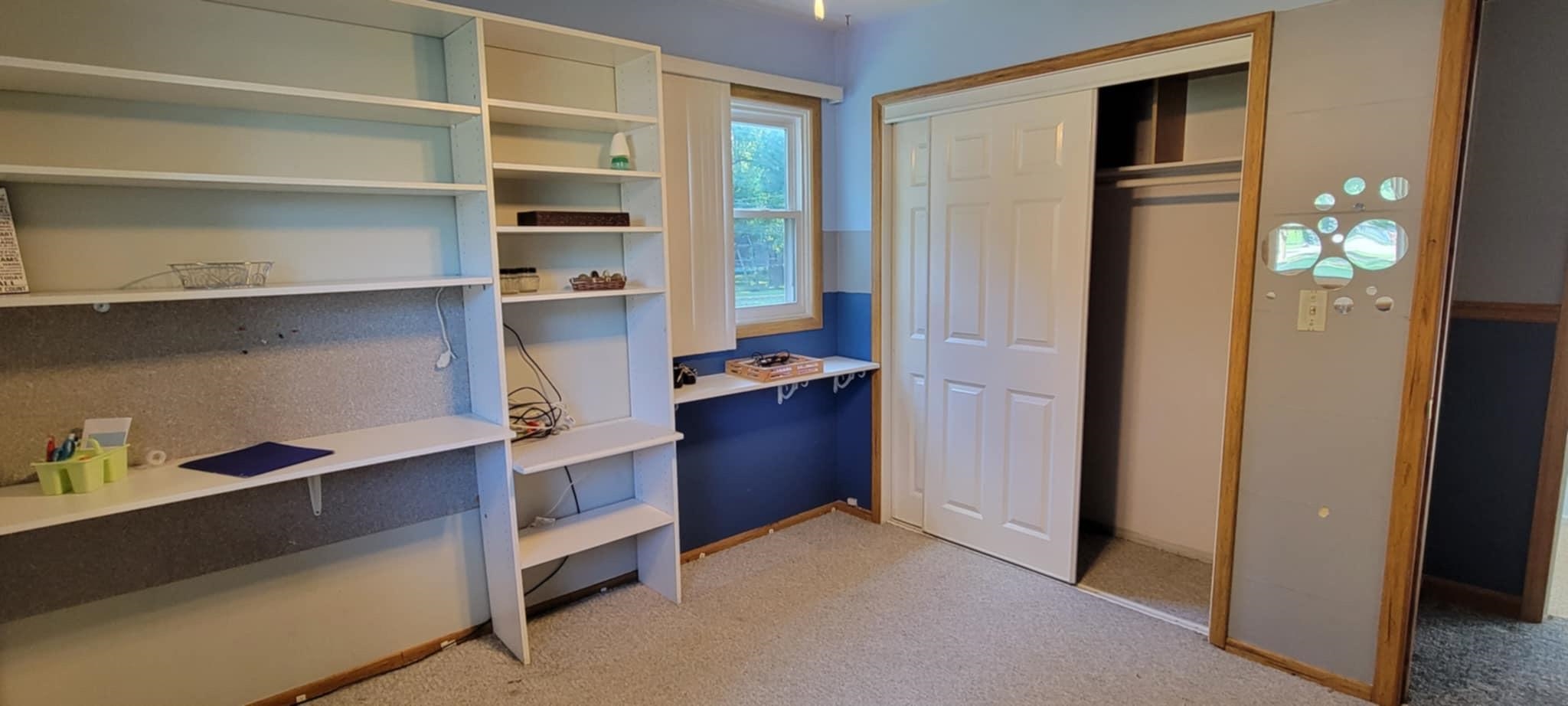 451 Rebecca Road Belvidere, IL 61008 - Photo 23 of 30 a view of walk in closet with empty racks