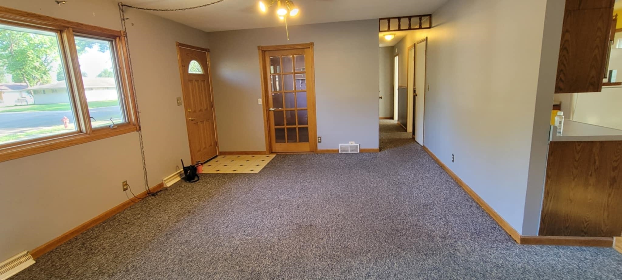 451 Rebecca Road Belvidere, IL 61008 - Photo 3 of 30 an empty room with windows