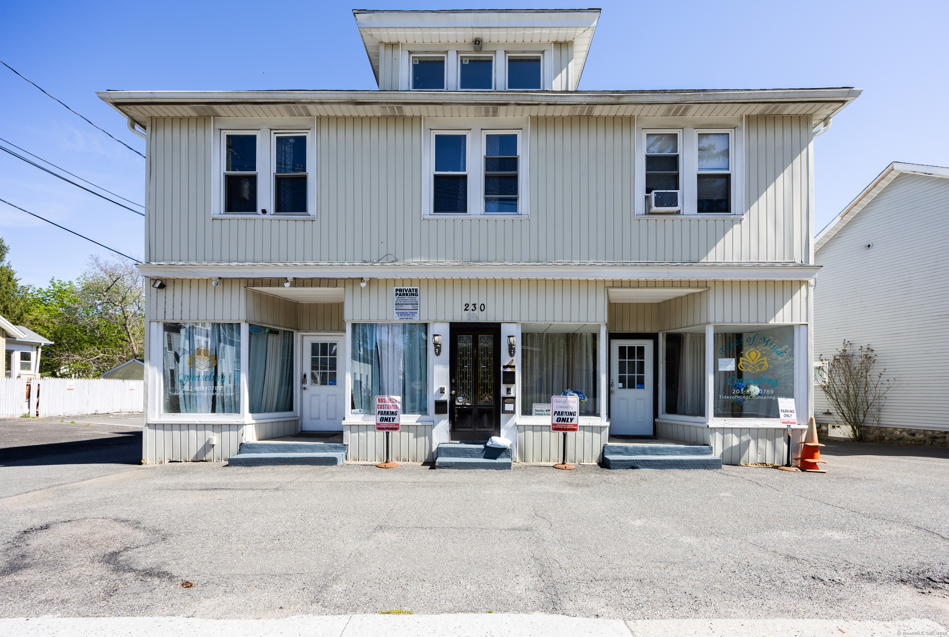 a view of a building with sitting area