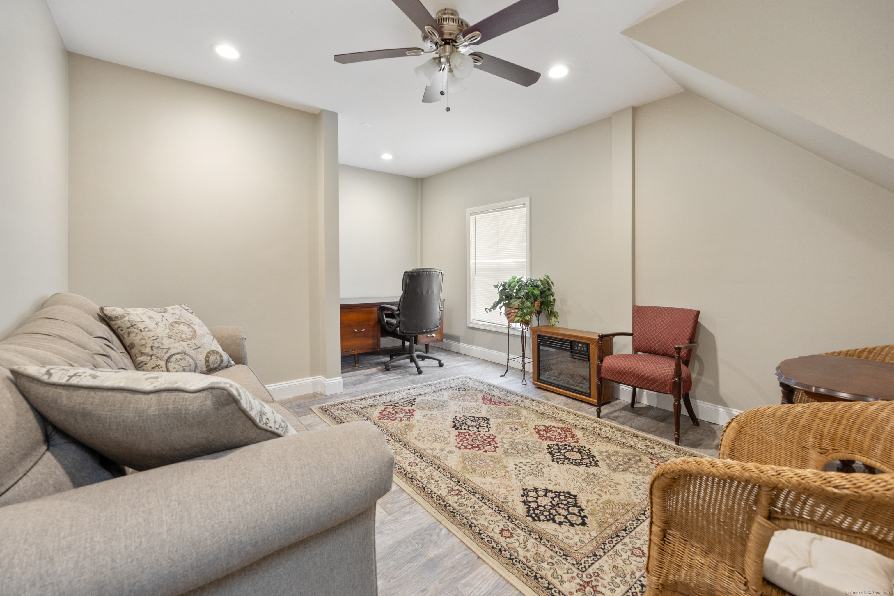230 Frost Road Waterbury, CT 06705 - Photo 14 of 24 a living room with furniture and a large window
