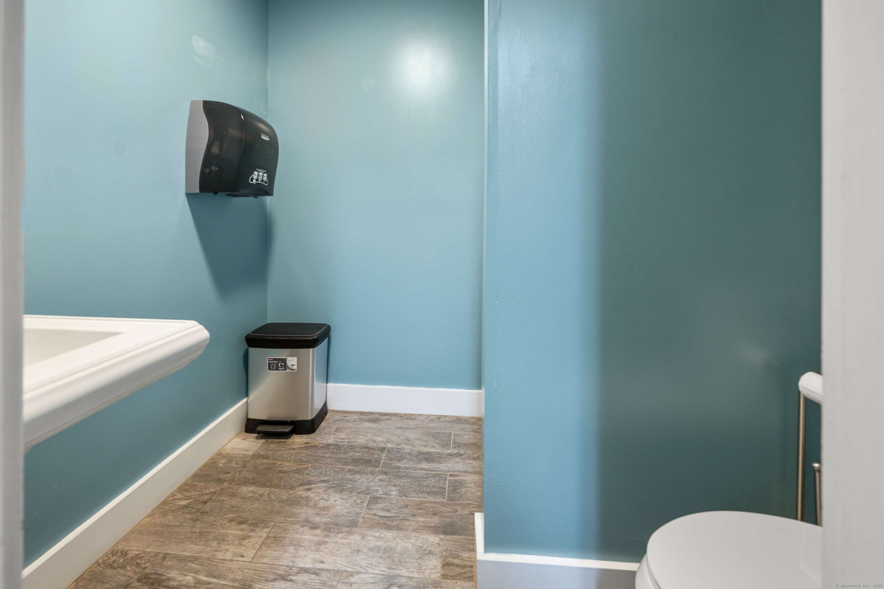 230 Frost Road Waterbury, CT 06705 - Photo 23 of 24 a white toilet sitting next to a shower