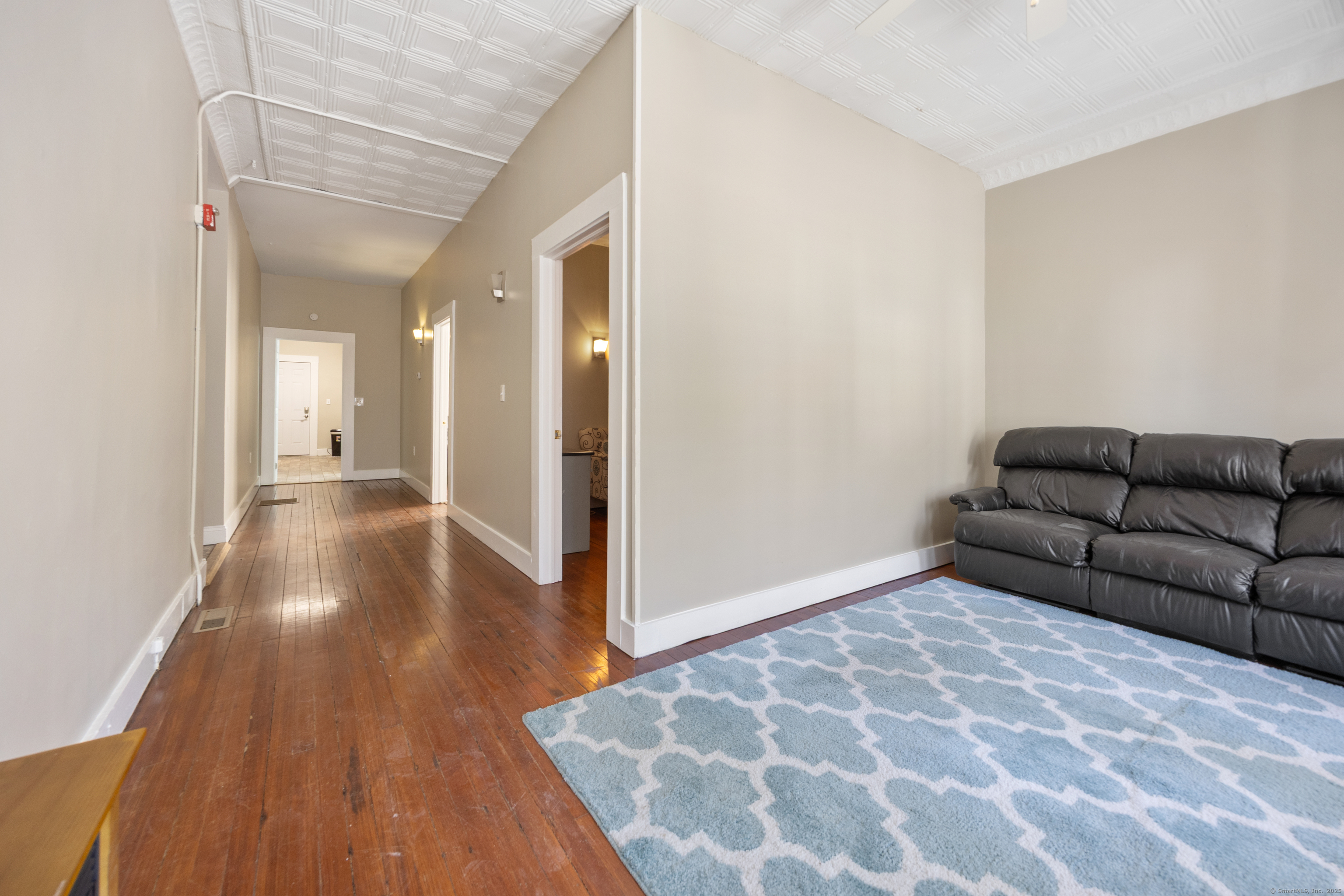230 Frost Road Waterbury, CT 06705 - Photo 7 of 24 a living room with furniture and a hard wood floor