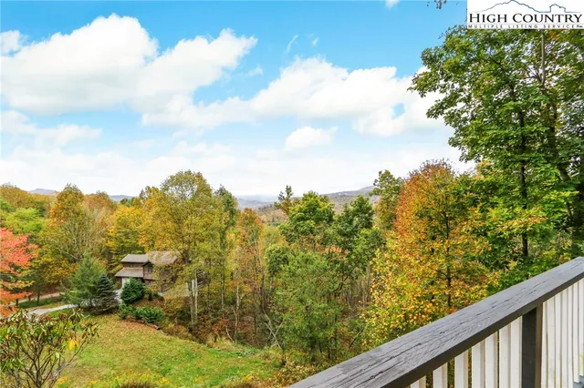 a view of a wooden deck with a patio