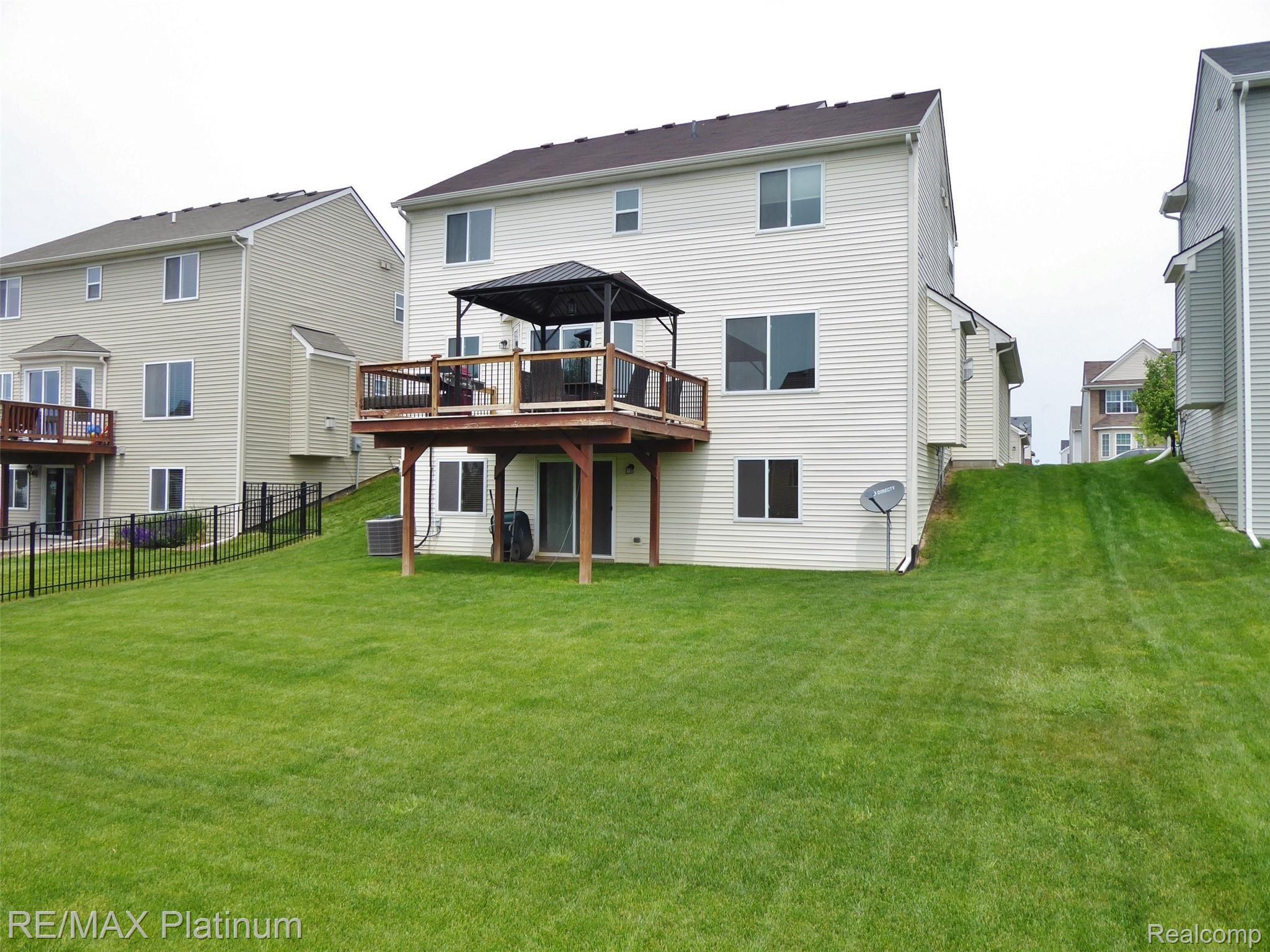 4114 Ash Tree Lane Howell, MI 48843 - Photo 27 of 34 Rear