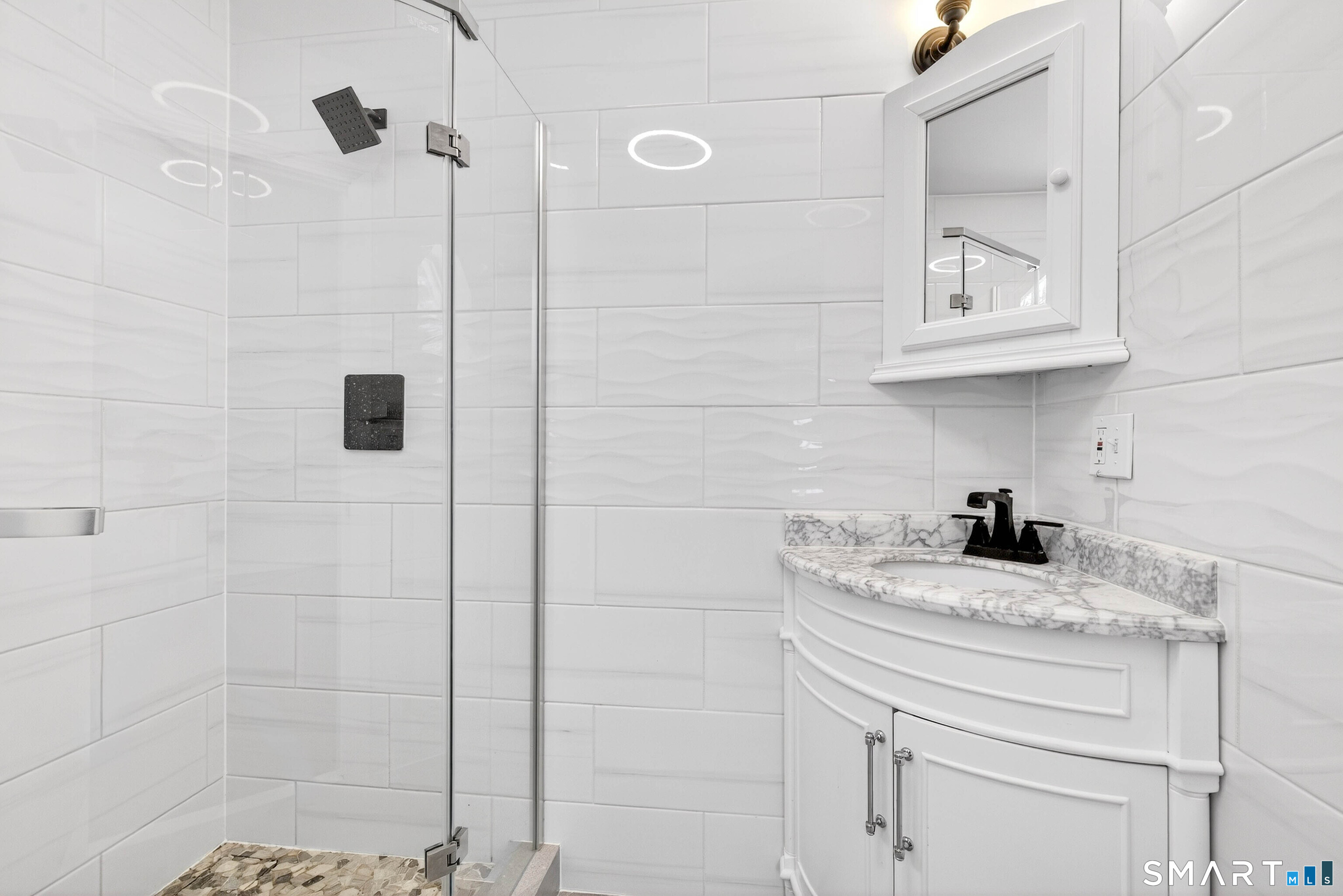 449 Lantern Hill Road Stonington, CT 06355 - Photo 13 of 40 a kitchen with a sink and cabinets