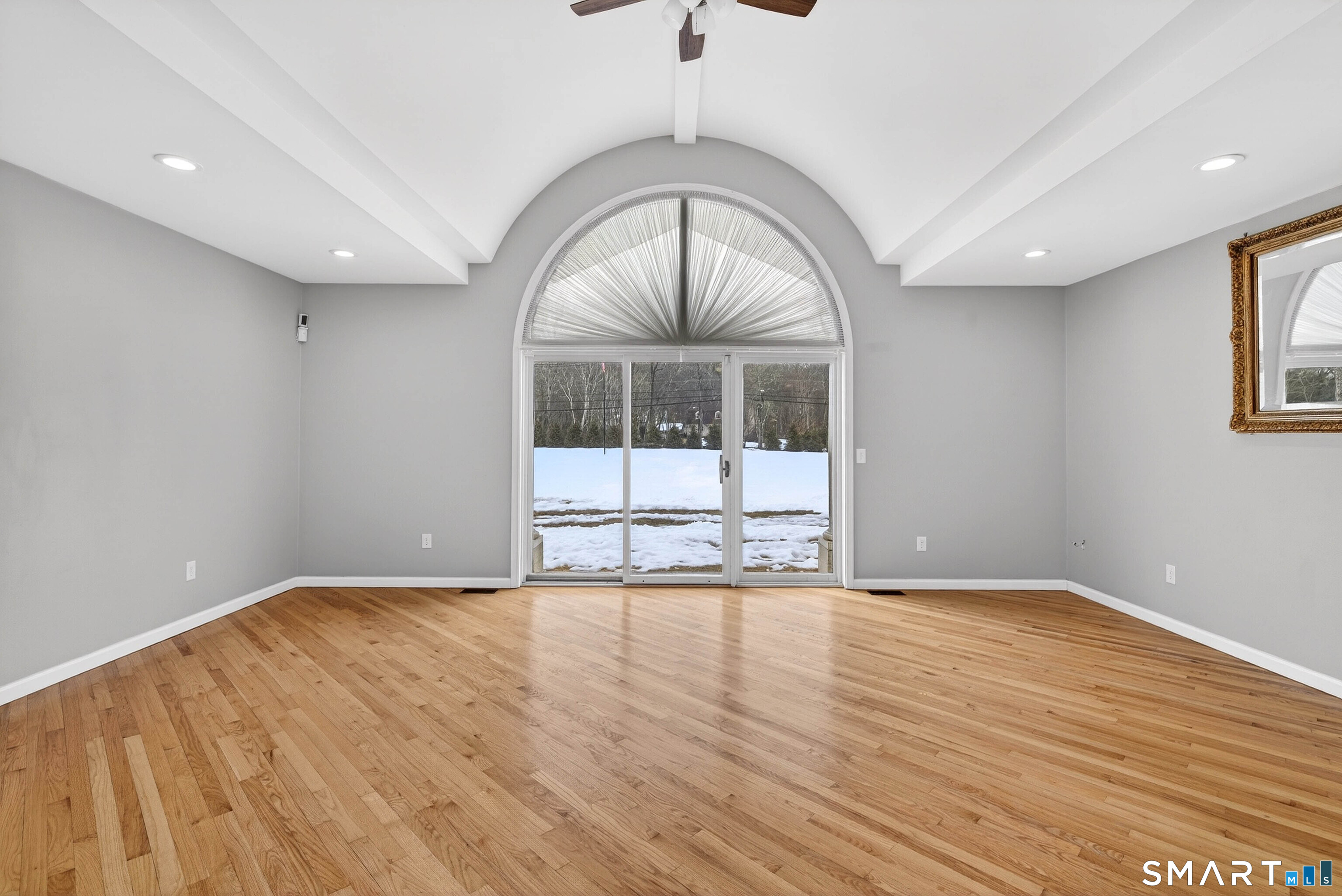 449 Lantern Hill Road Stonington, CT 06355 - Photo 18 of 40 wooden floor in an empty room with a window