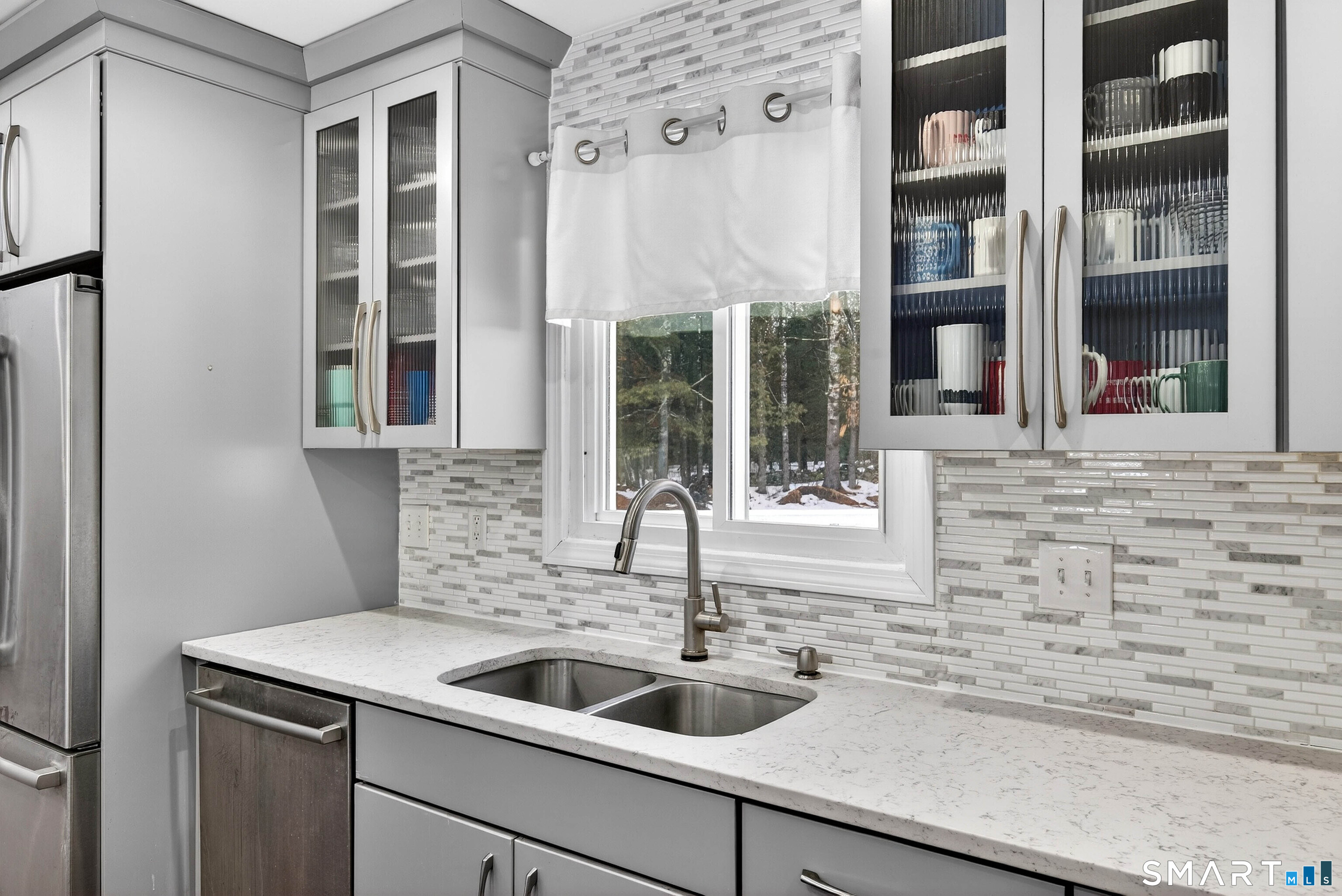 449 Lantern Hill Road Stonington, CT 06355 - Photo 29 of 40 a kitchen with a sink and a window