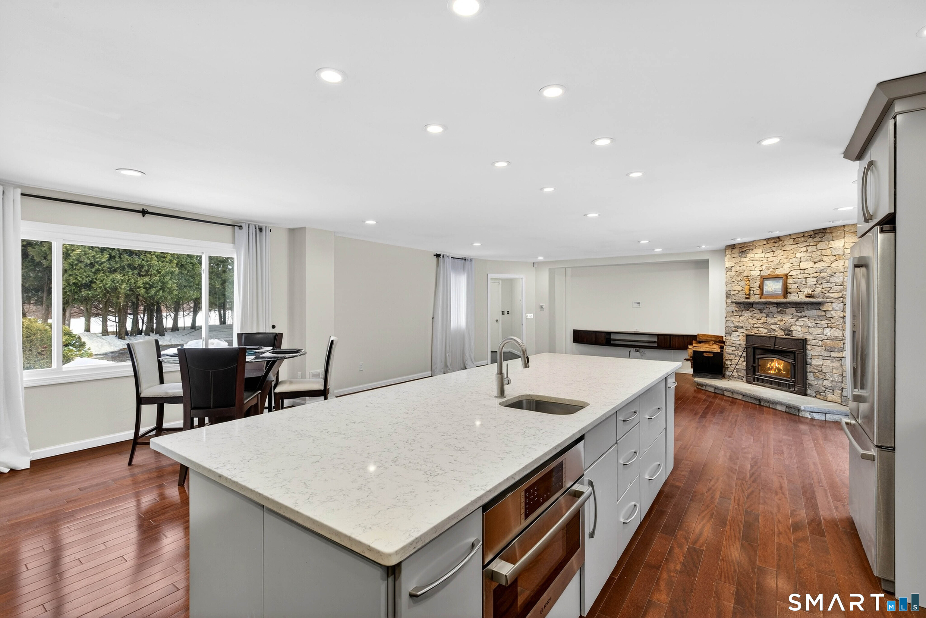 449 Lantern Hill Road Stonington, CT 06355 - Photo 31 of 40 a large kitchen with a counter space a sink and appliances