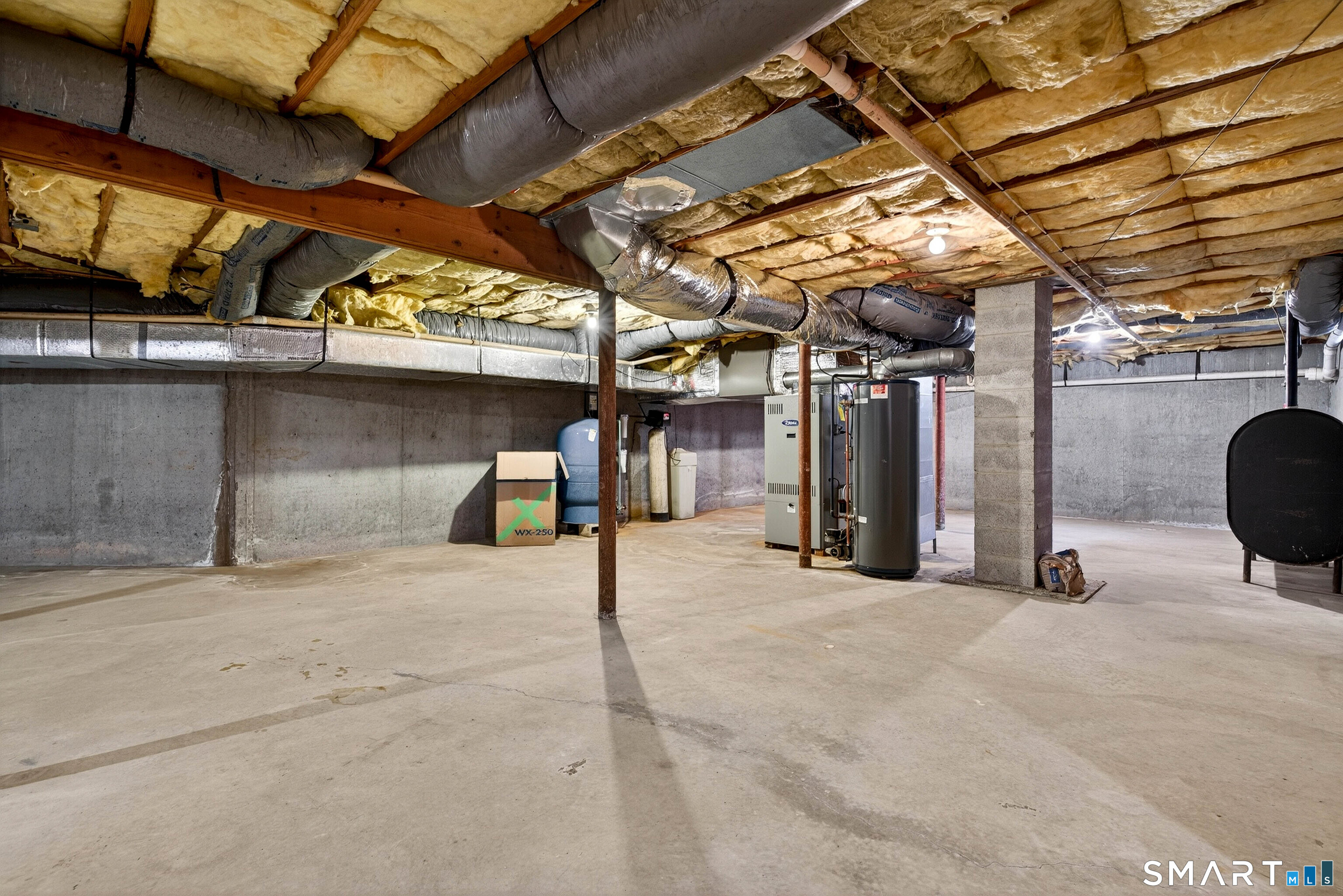 449 Lantern Hill Road Stonington, CT 06355 - Photo 6 of 40 a view of a garage with wooden wall