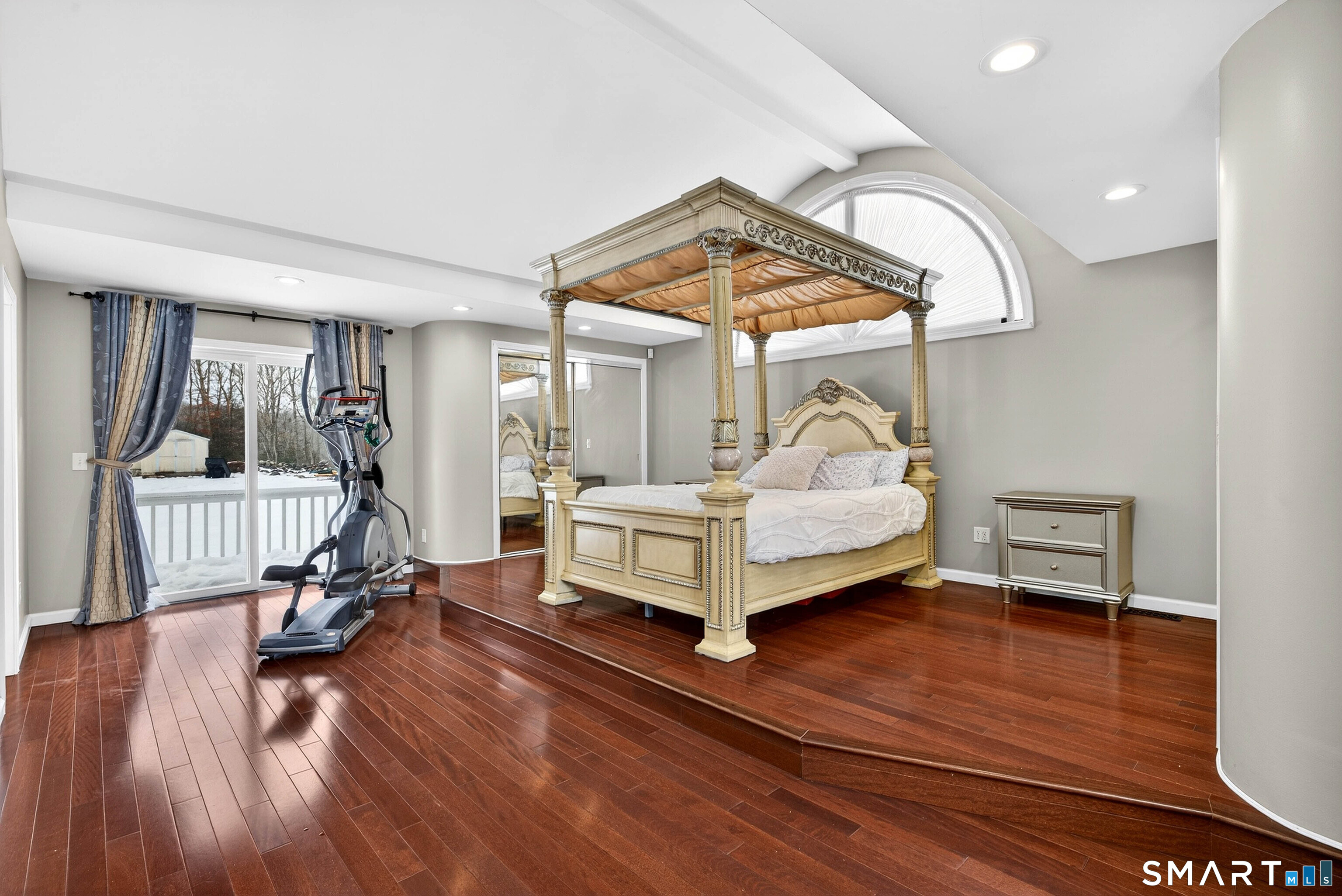 449 Lantern Hill Road Stonington, CT 06355 - Photo 9 of 40 a spacious bedroom with a bed and a window