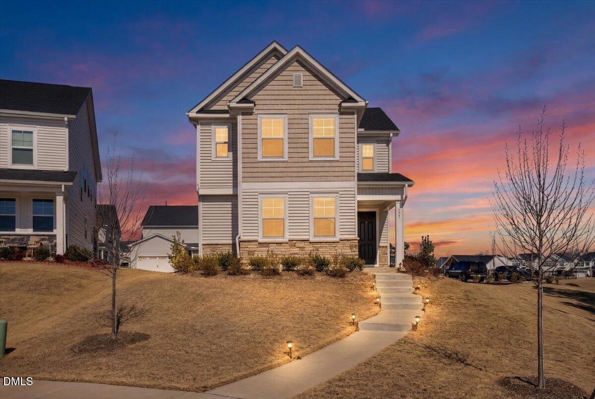 137 Moraine Court Raleigh, NC 27610 - Photo 2 of 40 02-137 Moraine Ct Dusk copy