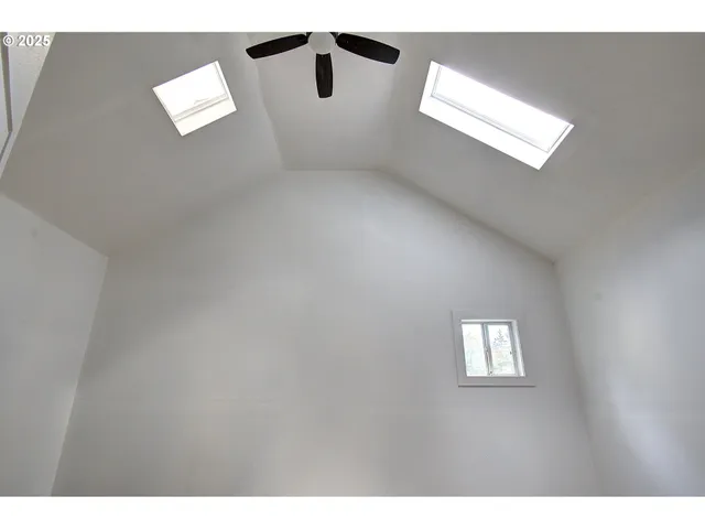 a view of empty room with windows