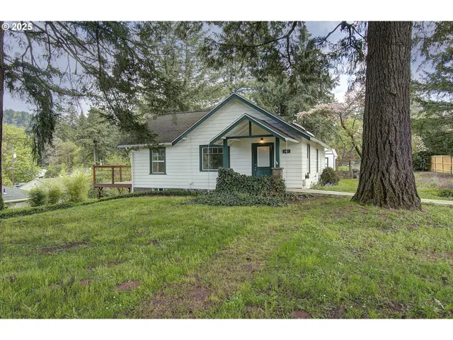 a house view with a garden space