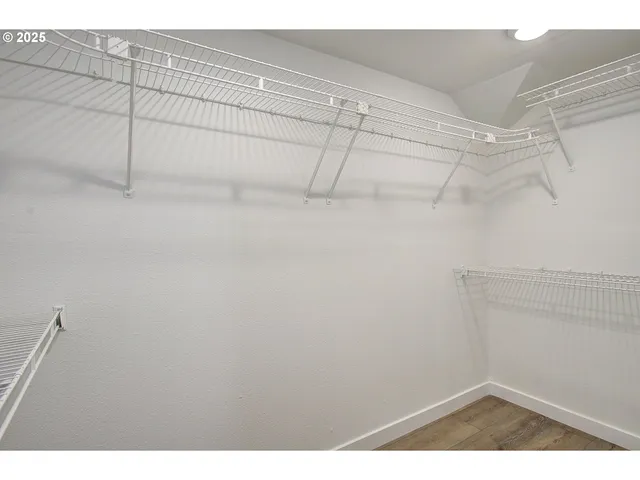 a view of a room with racks on the wall