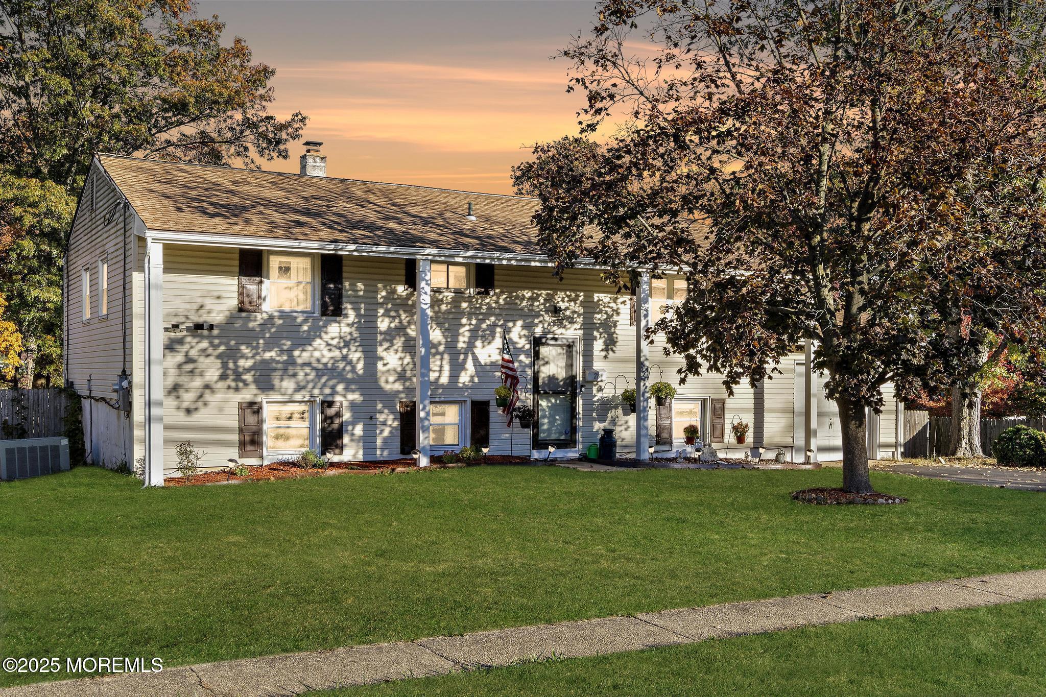 front view of house with a yard
