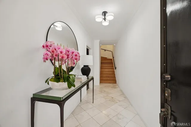 a view of entryway with flower pots