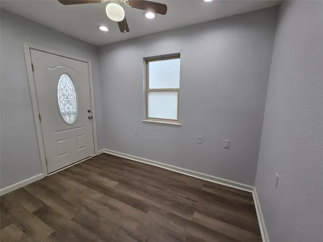 an empty room with windows