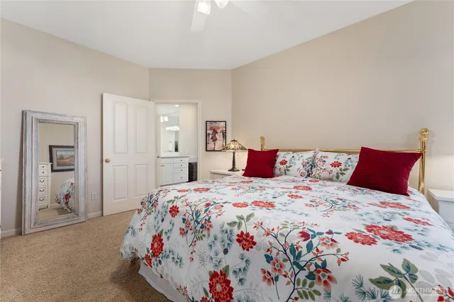 a bedroom with a bed and a cabinets