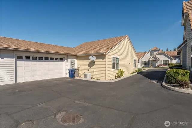 a view of front of house with a yard