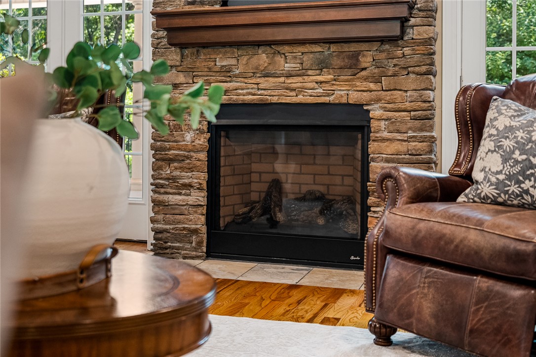 200 Graylyn Drive Anderson, SC 29621 - Photo 8 of 48 A striking stacked stone fireplace commands attention in this inviting living space.