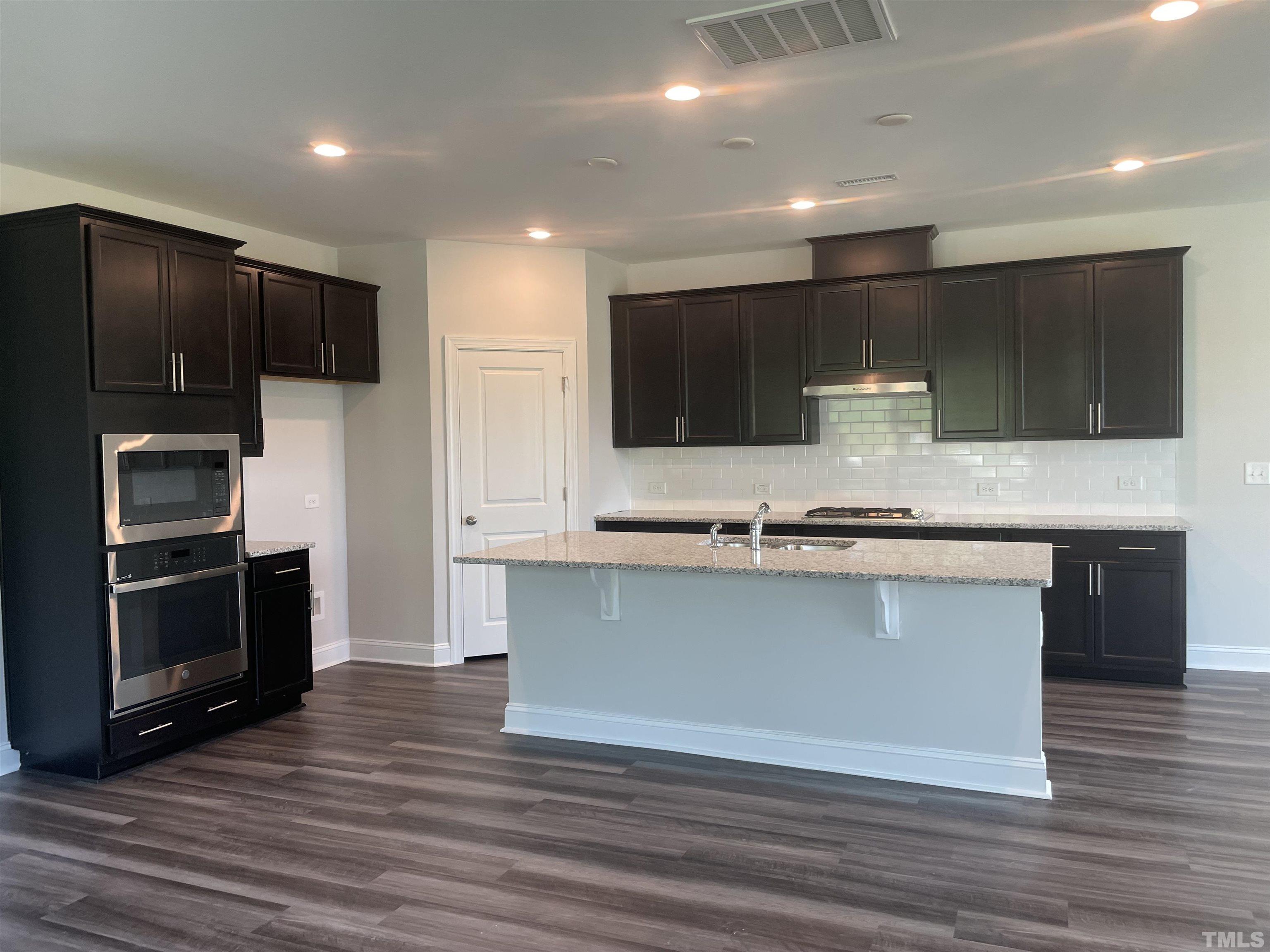 4945 Enlightenment Road, Unit 2115 Raleigh, NC 27616 - Photo 19 of 22 Photo is not actual home for sale. Photo provided to show casual dining area in this floorplan