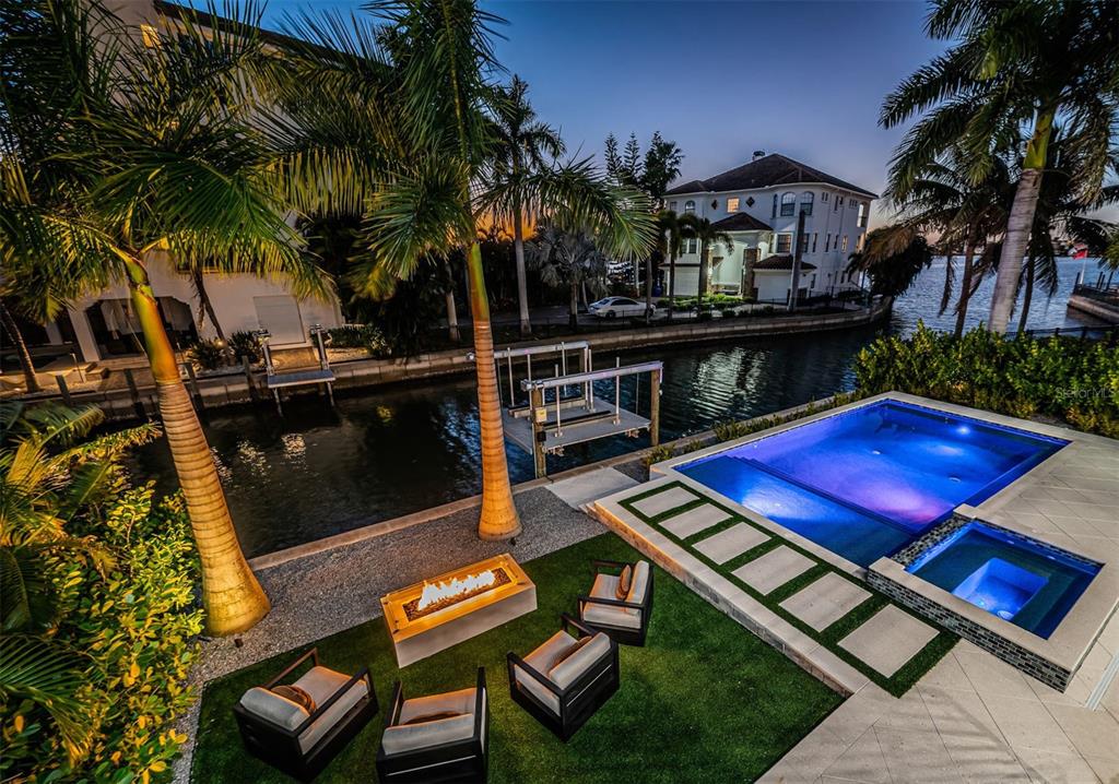 218 Sydney Lane Redington Shores, FL 33708 - Photo 23 of 100 a view of a balcony with furniture and a potted plant