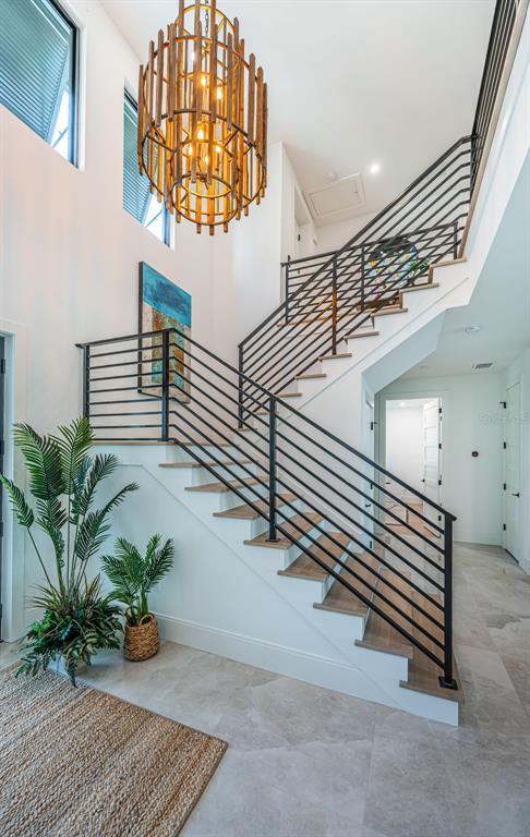 218 Sydney Lane Redington Shores, FL 33708 - Photo 48 of 100 a view of entryway and hall with wooden floor