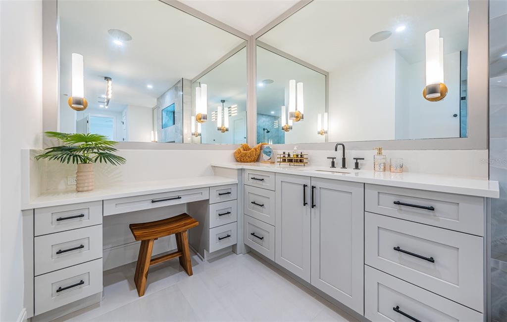 218 Sydney Lane Redington Shores, FL 33708 - Photo 65 of 100 a view of cabinets a sink and a mirror in a room