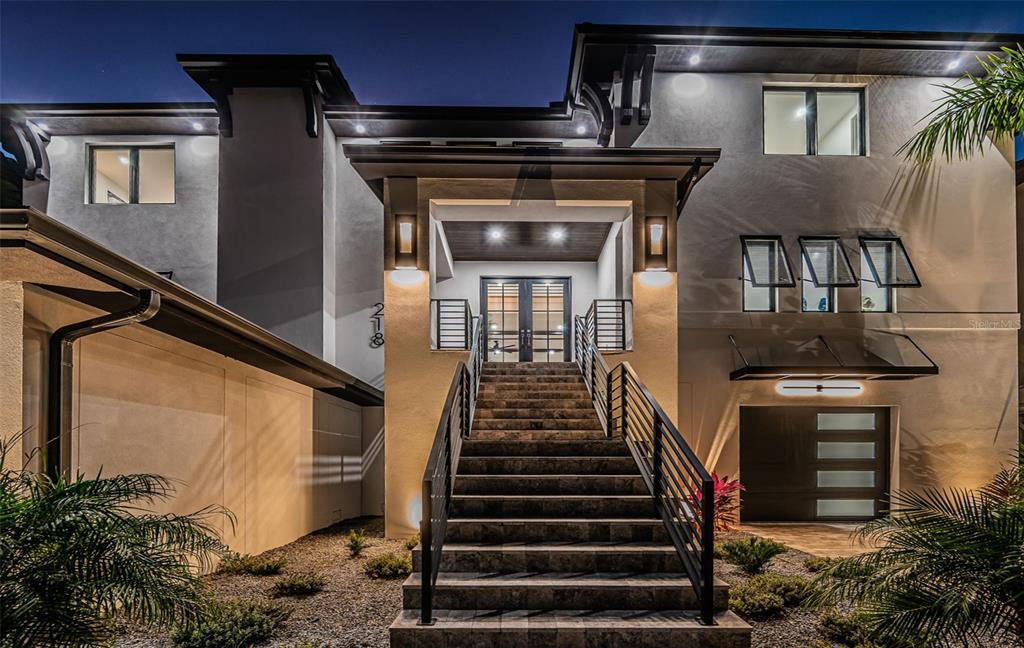 218 Sydney Lane Redington Shores, FL 33708 - Photo 7 of 100 a view of entryway and hall with wooden floor