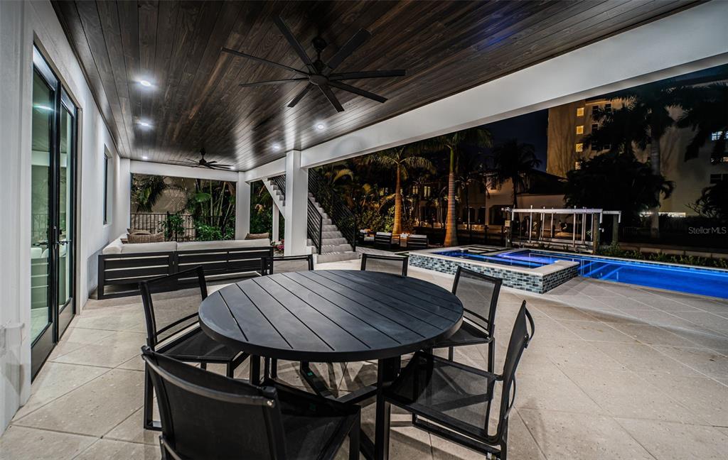 218 Sydney Lane Redington Shores, FL 33708 - Photo 88 of 100 a outdoor space with chairs