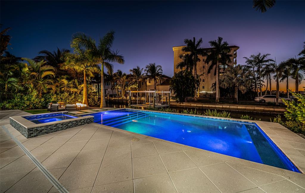 218 Sydney Lane Redington Shores, FL 33708 - Photo 90 of 100 a view of swimming pool with outdoor seating