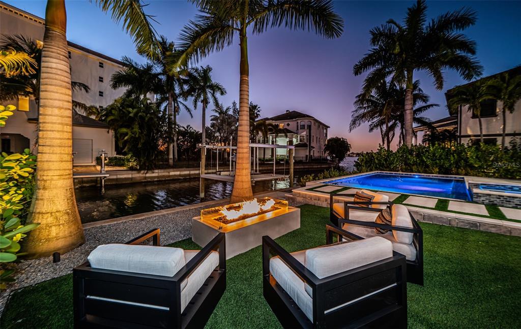 218 Sydney Lane Redington Shores, FL 33708 - Photo 94 of 100 a view of outdoor space yard swimming pool and furniture