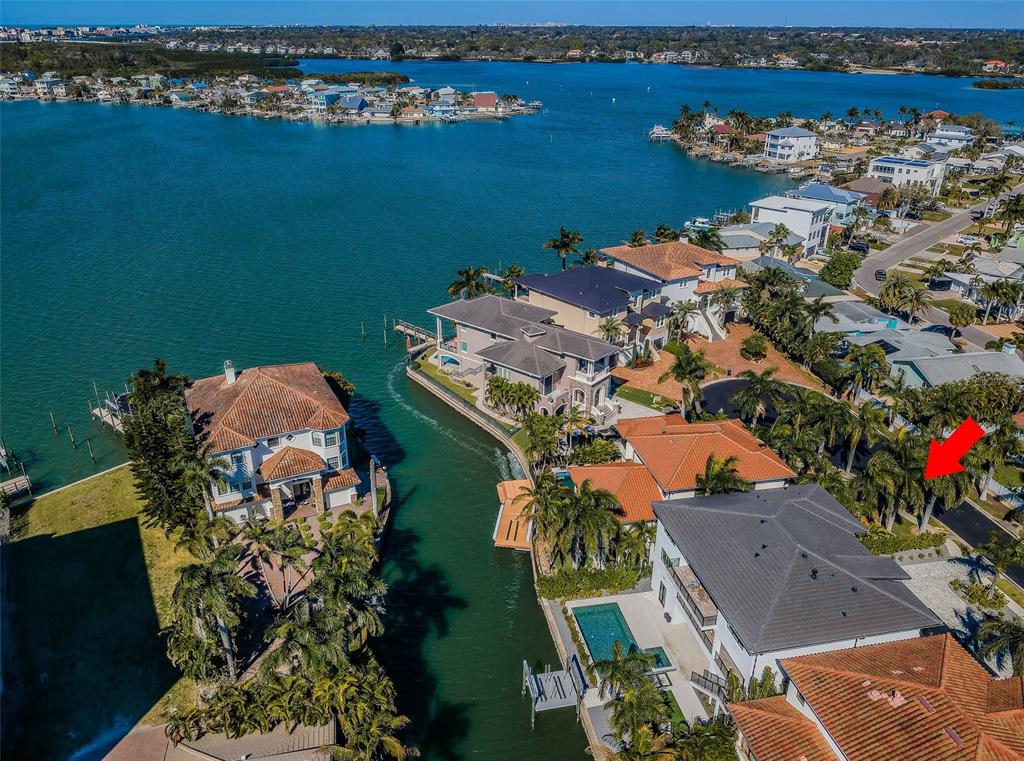 218 Sydney Lane Redington Shores, FL 33708 - Photo 98 of 100 an aerial view of a house with a lake view