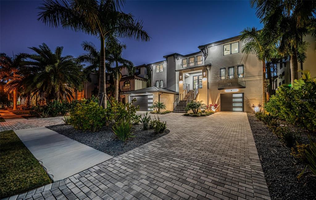 218 Sydney Lane Redington Shores, FL 33708 - Photo 100 of 100 a front view of a house having yard