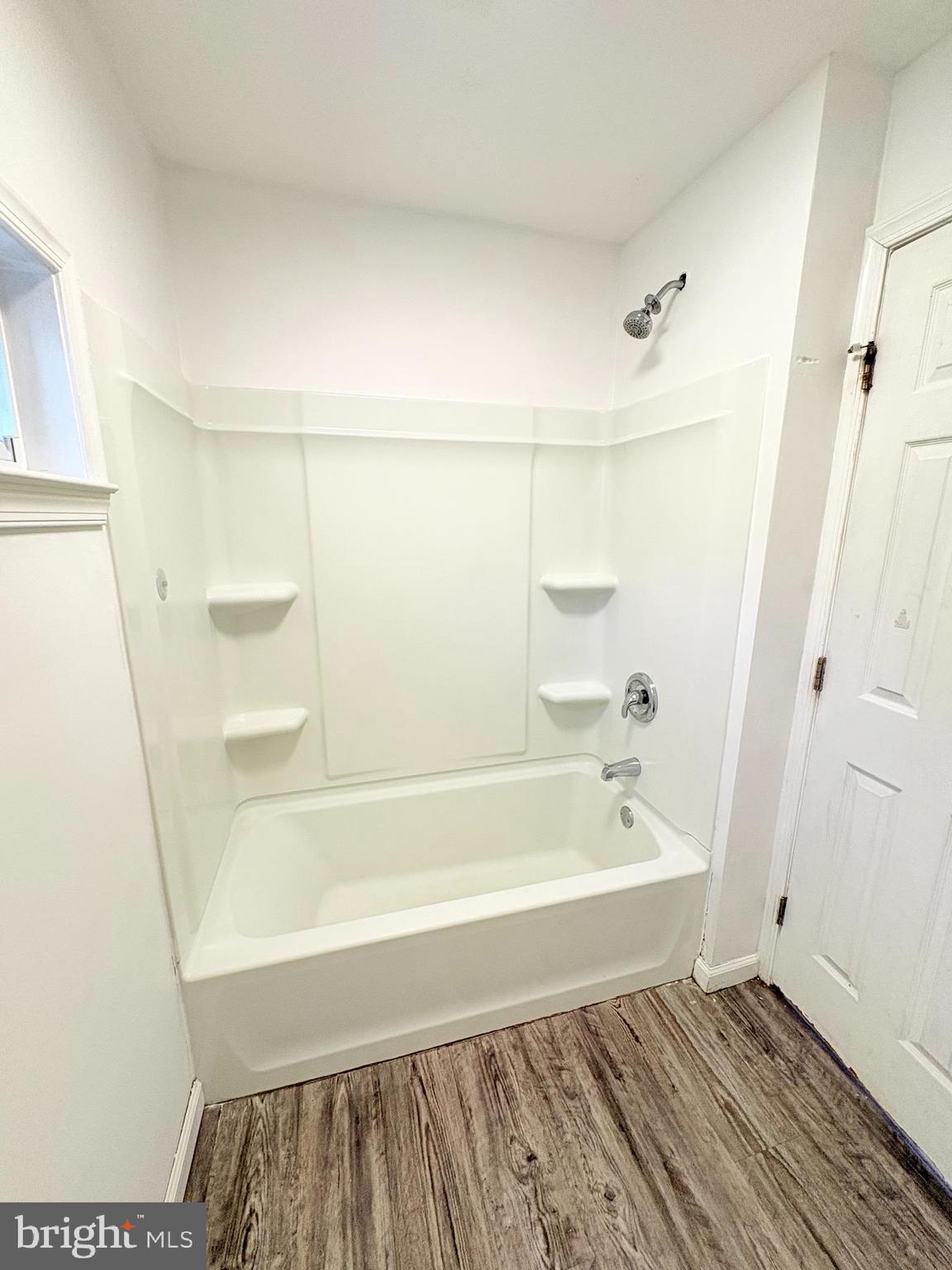 1630 East 9th Street Bethlehem, PA 18015 - Photo 13 of 17 a bathroom with a bathtub and shower