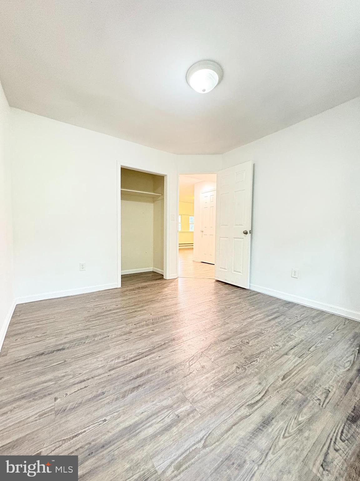 1630 East 9th Street Bethlehem, PA 18015 - Photo 7 of 17 a view of an empty room and wooden floor