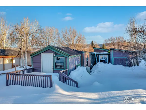 an aerial view of residential building and parking space