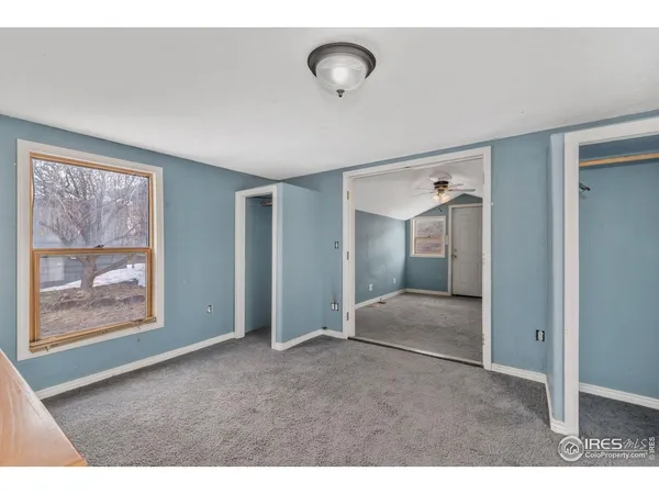 a bathroom with a sink a mirror and a shower