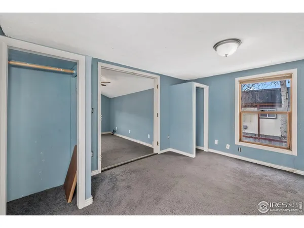 a room with furniture and window