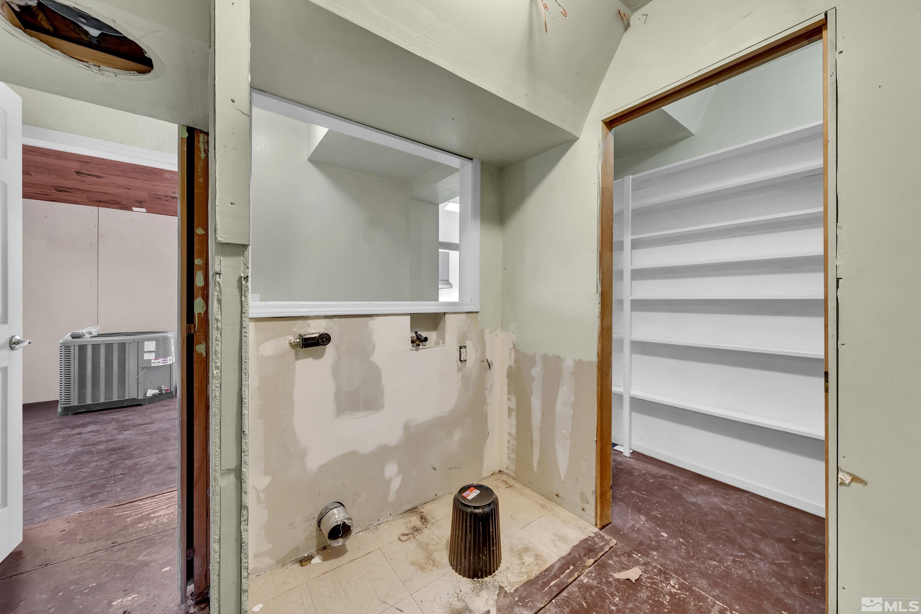 333 Territory Road Dayton, NV 89403 - Photo 11 of 38 a bathroom with a glass shower door