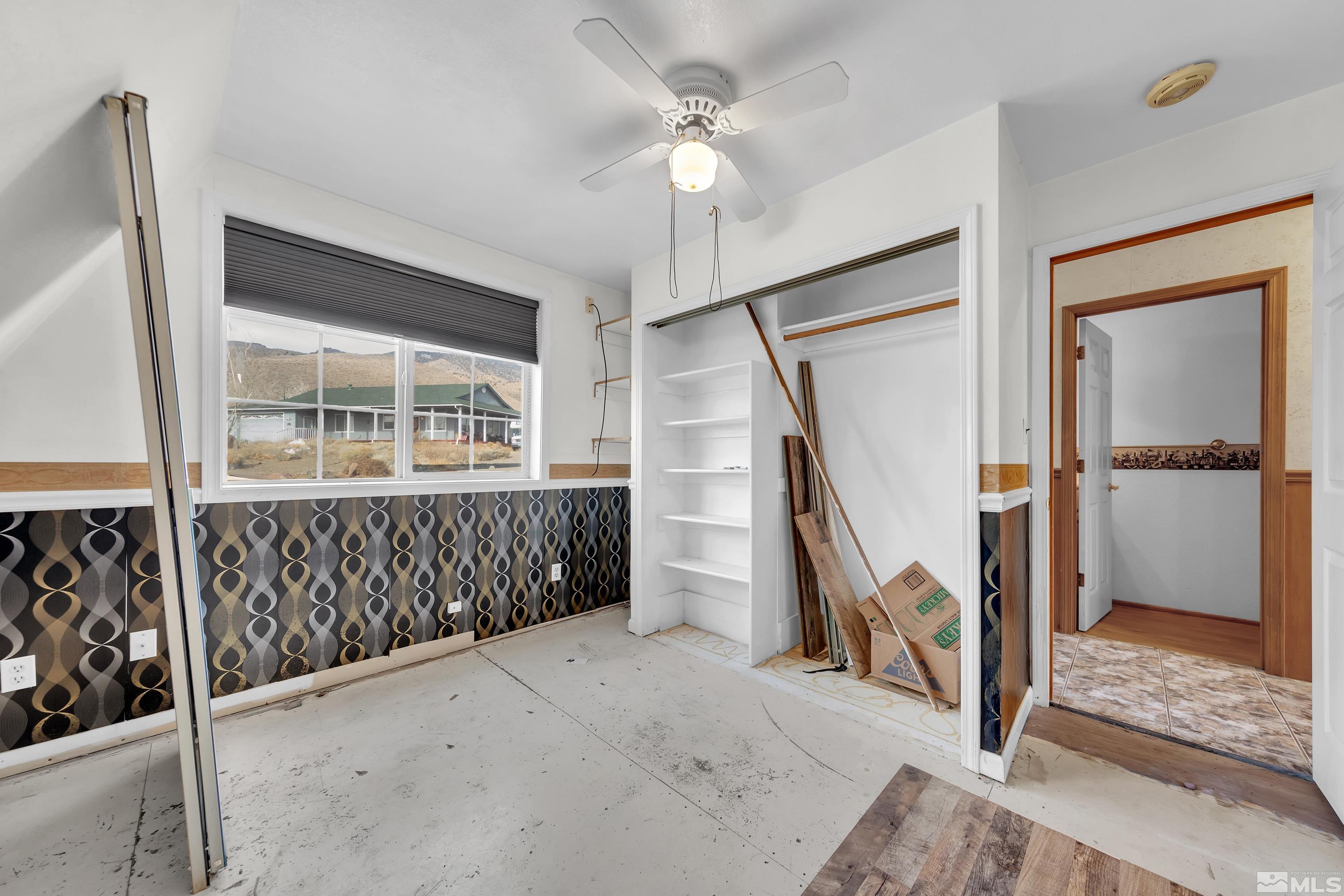 333 Territory Road Dayton, NV 89403 - Photo 24 of 38 a view of an empty room with stairs
