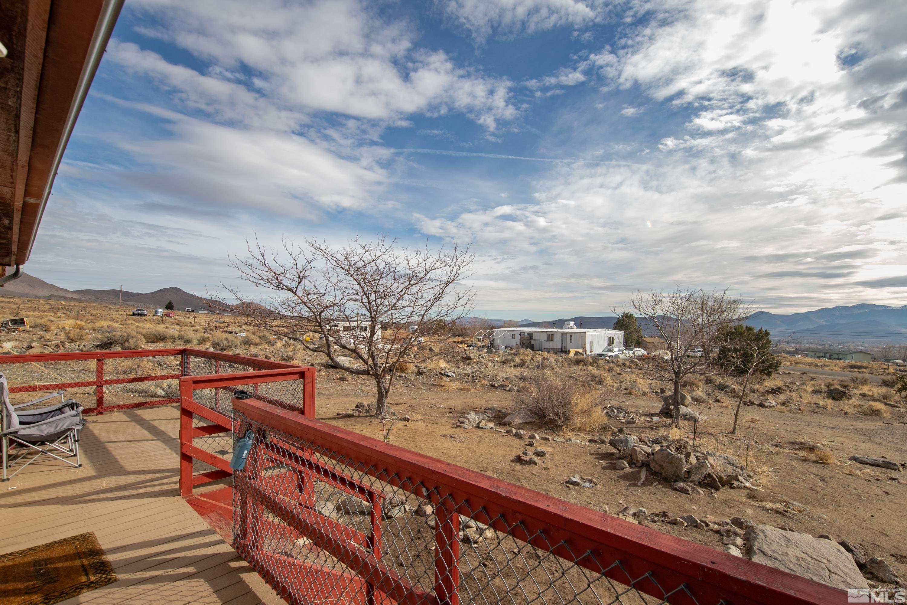 333 Territory Road Dayton, NV 89403 - Photo 34 of 38 a view of a yard with wooden fence