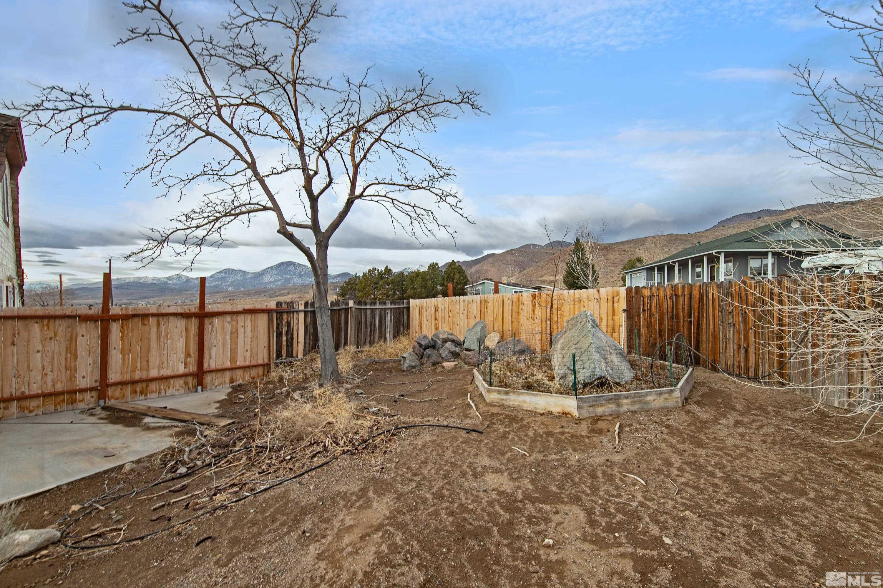 333 Territory Road Dayton, NV 89403 - Photo 37 of 38 a view of a backyard with wooden fence
