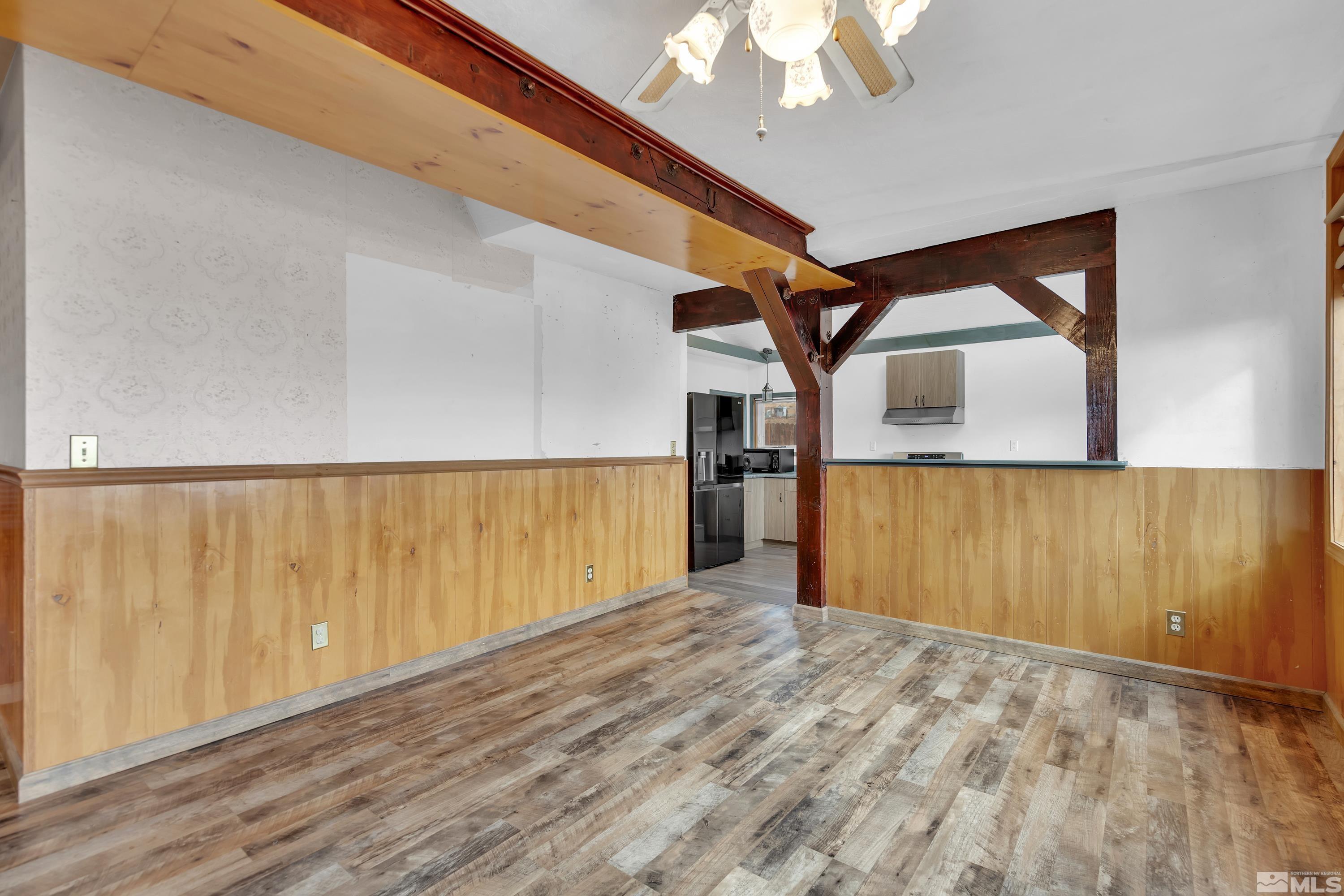 333 Territory Road Dayton, NV 89403 - Photo 6 of 38 a view of empty room with wooden floor