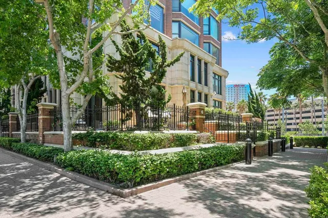a view of a building with a garden