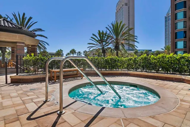 a view of a swimming pool with a patio