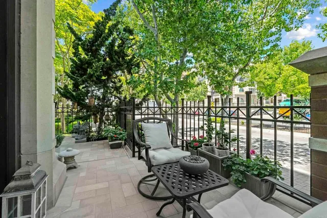 a view of a chairs and table in the patio