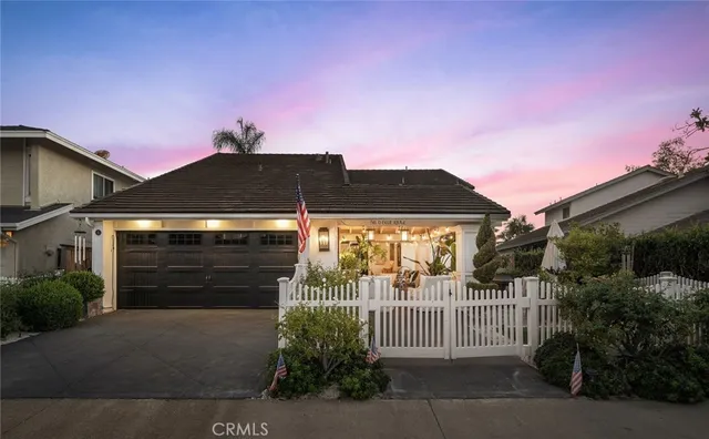a front view of a house with a garage