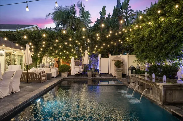 a view of a swimming pool with patio